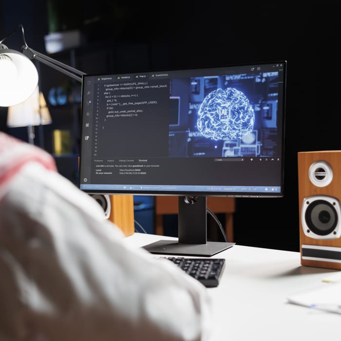 AI sportfogadás - AI sportfogadást elmez laptopon